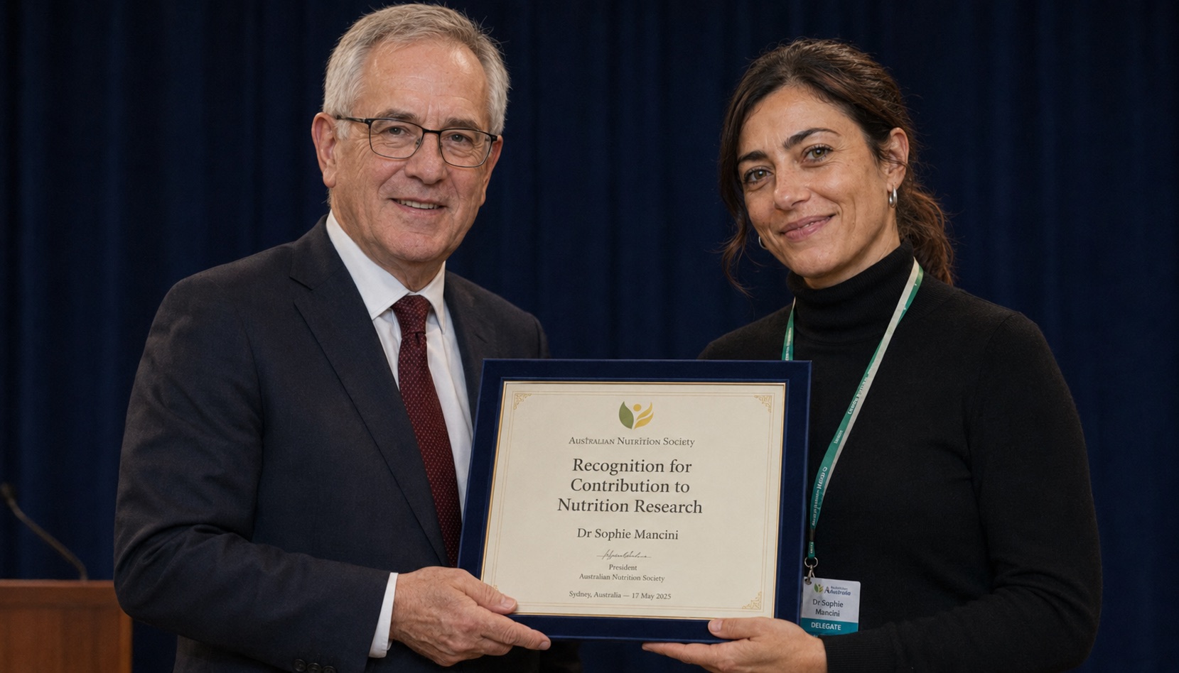 Sophie receiving recognition for her contribution to nutrition science